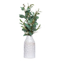 BRANCHE D'OLIVIER DANS UN VASE BOUTEILLE BLANC